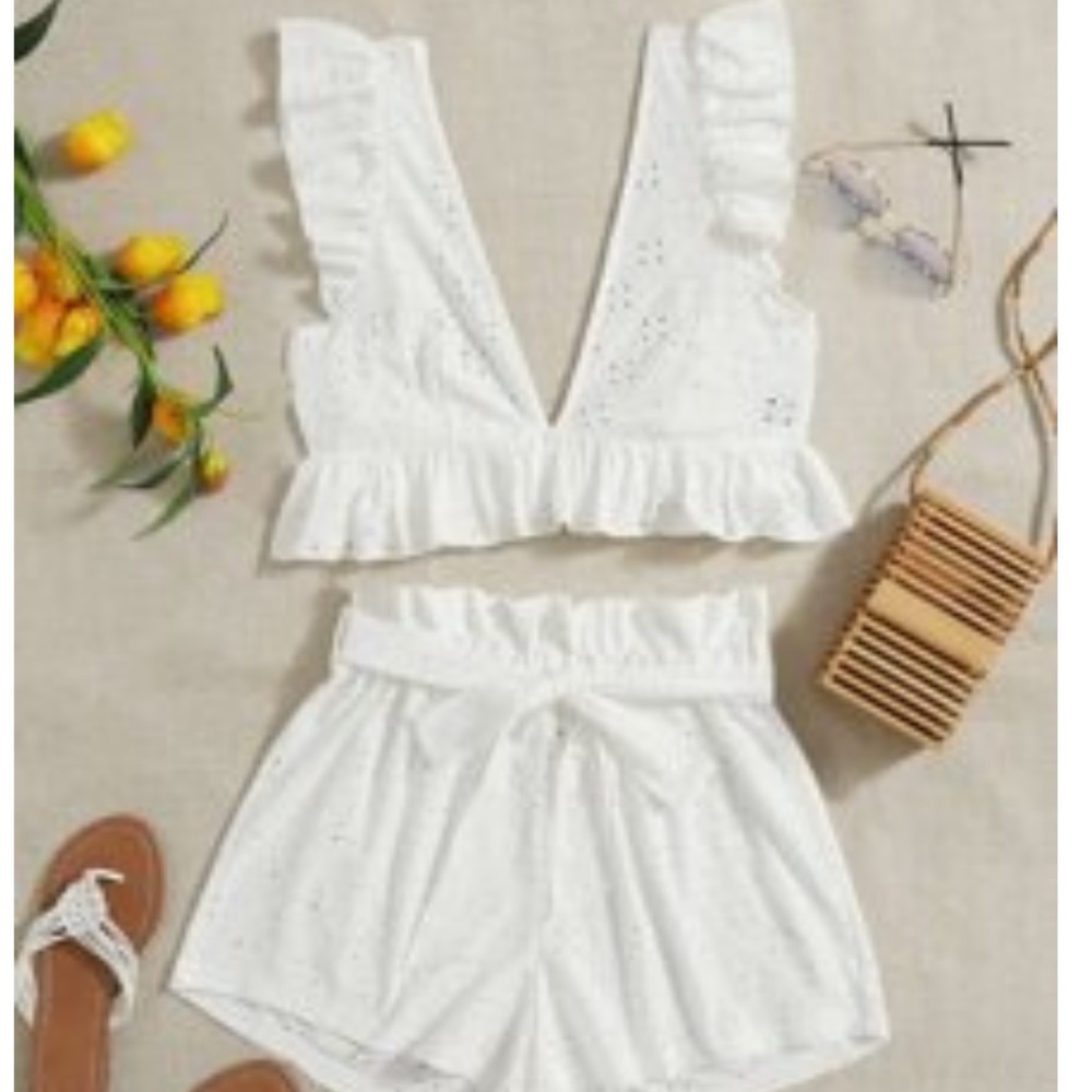 White shorts and croptop